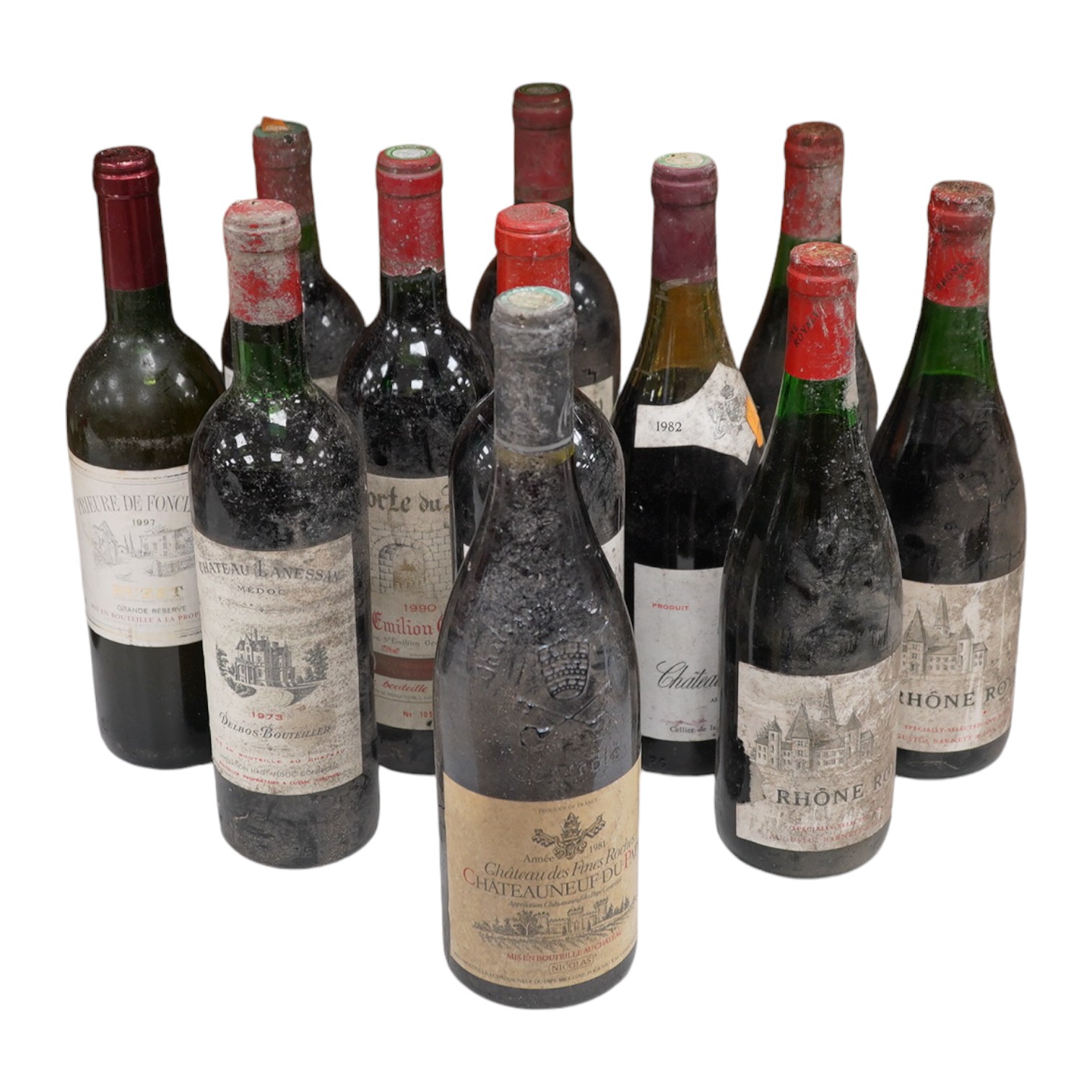 Eleven bottles of red wine to include two bottles of Porte du Roy, St-Emilion Grand Cru, 1990 and a bottle of Chateauneuf du Pape 1981 & 1982. Condition - storage unknown